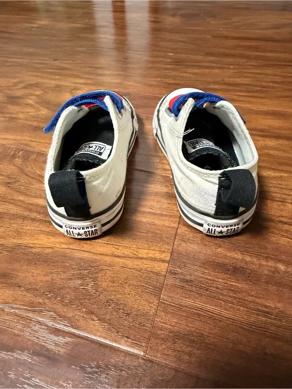 Toddler Converse White Canvas Sneakers with Black Tongue and Red & Blue Straps